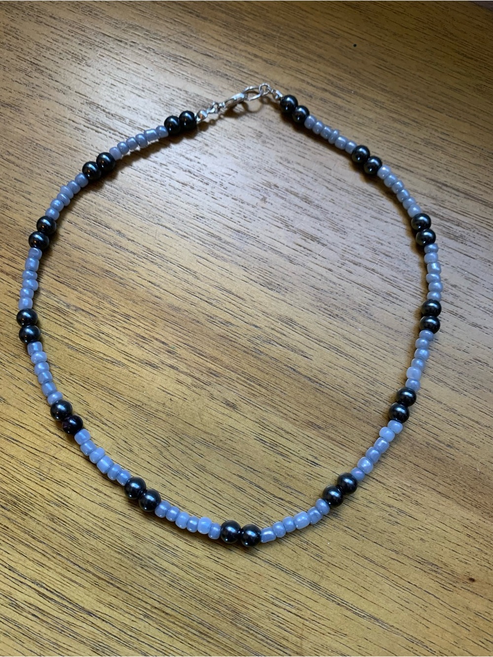 Delicate Blue and Black Beaded Necklace with Silver Clasp